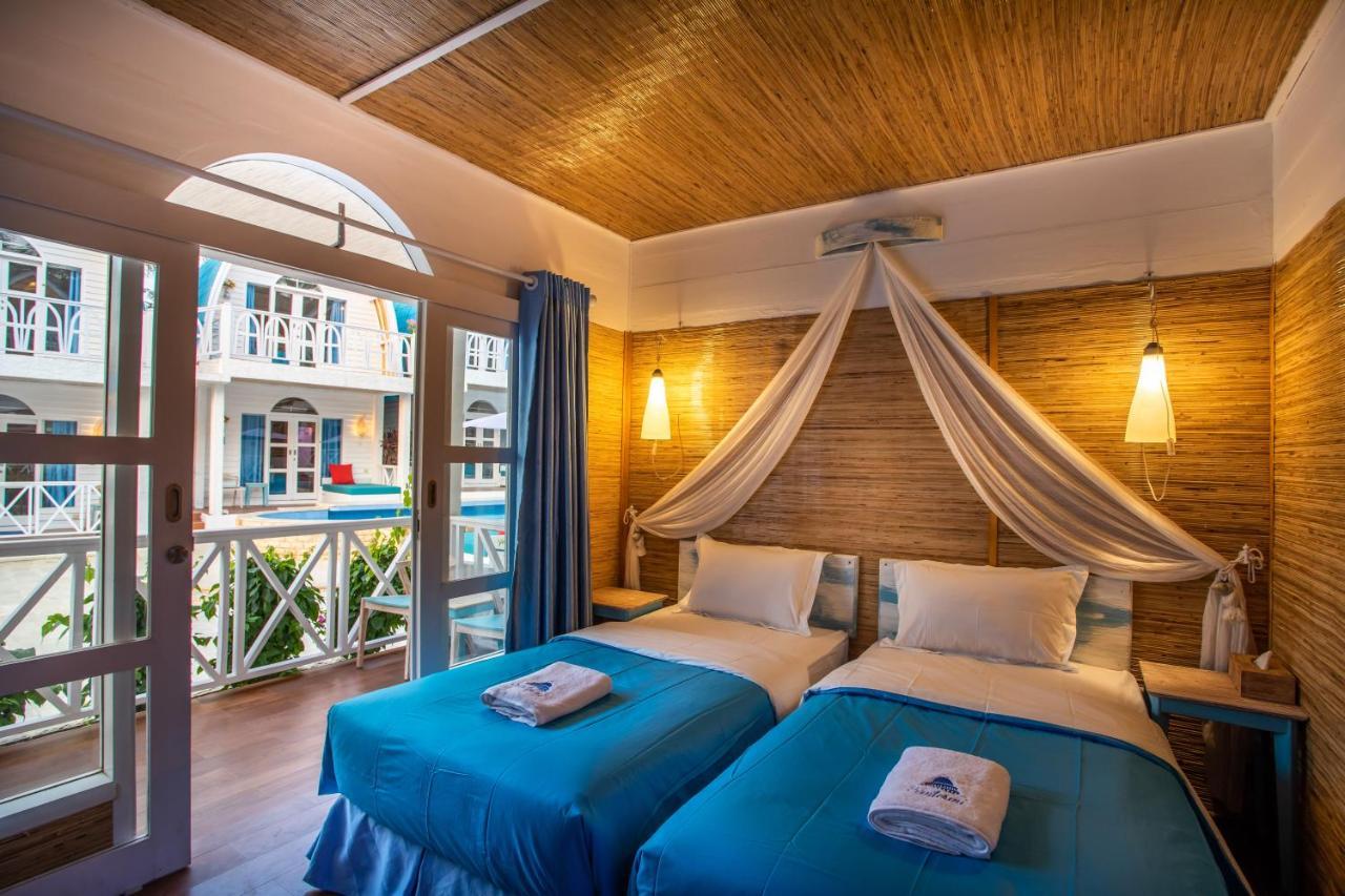 ซันโตรินี บีช รีสอร์ต Hotel กีลีตราวางัน ภายนอก รูปภาพ